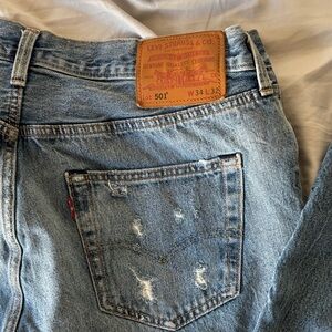 Levi's light blue distressed denim jeans
